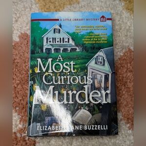 A Most Curious Murder by Elizabeth Kane Buzzelli